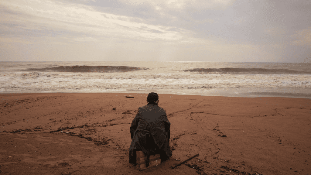 No Self, No Problem Person Wearing Gray Dress Shirt Sitting on Seashore by Engin Akyurt from Pexels (Free use via Canva)