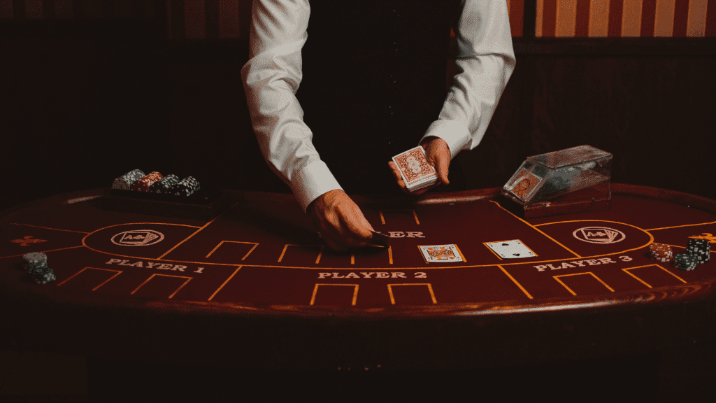 Difference Between Giving Up and Quitting Man Displaying Cards in Casino by Anna Shvets from Pexels (Free use via Canva)